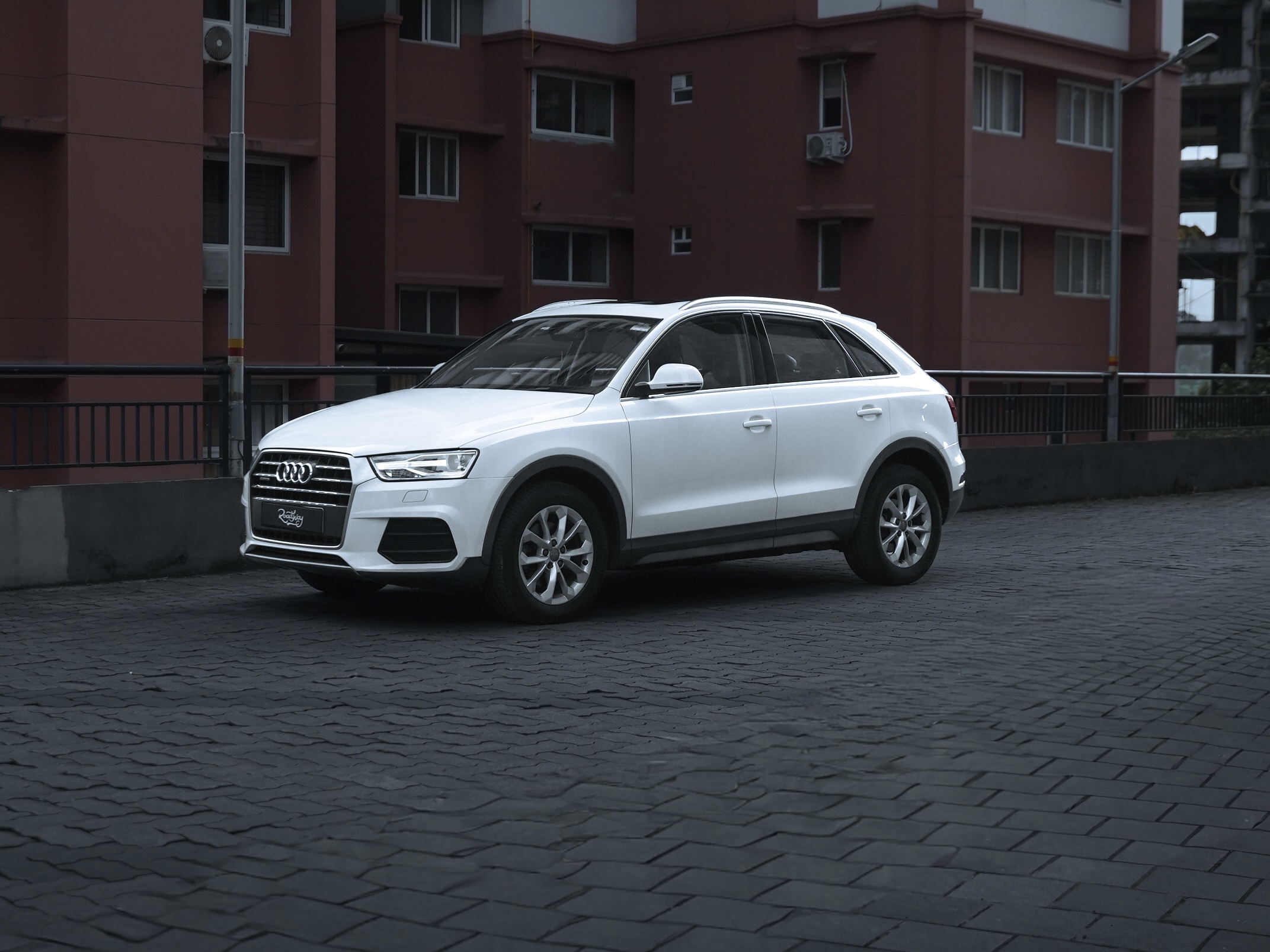 Used Audi Q3 diesel SUV side view – premium used luxury car in India